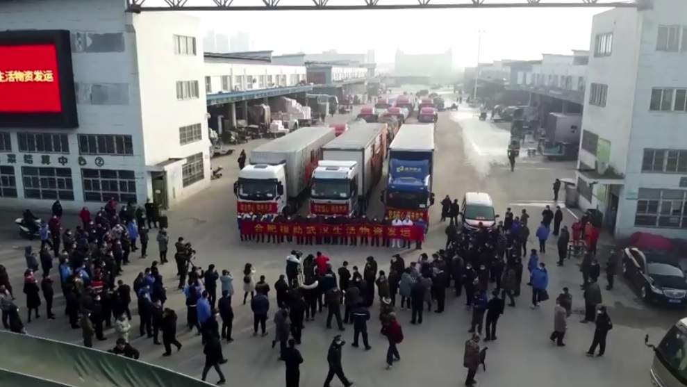 Trucks in Hefei City in eastern China loaded with vegetables for Wuhan.