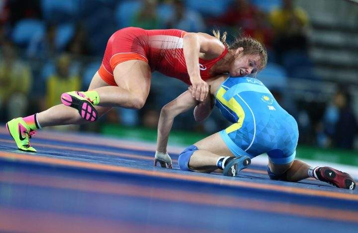 Erica Wiebe (left) of Canada and Guzel Manyurova of Kazakhstan fight in their women’s 75kg freestyle wrestling gold medal match at the Rio 2016 Summer Olympic Games on Aug. 18, 2016. Wiebe won the bout.