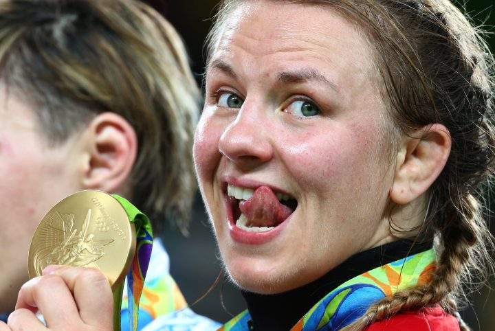 Erica Wiebe of Canada poses with her gold medal at the victory ceremony for the women’s 75 kg freestyle wrestling event at the Rio 2016 Summer Olympic Games on Aug. 18, 2016.