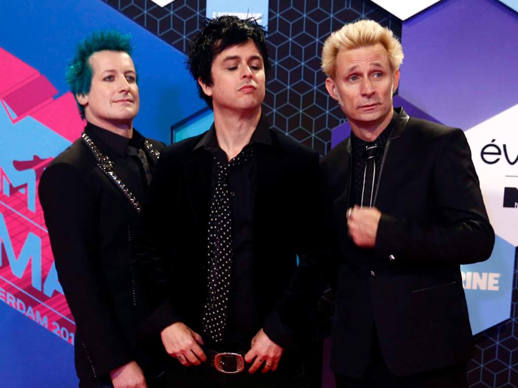 (L-R) Tré Cool, Billie Joe Armstrong and Mike Dirnt of Green Day pose for photographers upon arrival at the MTV European Music Awards 2016 in Rotterdam, Netherlands, on Sunday, Nov. 6, 2016.