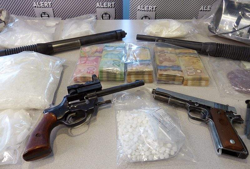 Drugs and firearms were seized from two Calgary homes searched on Jan. 23, 2020, police said.