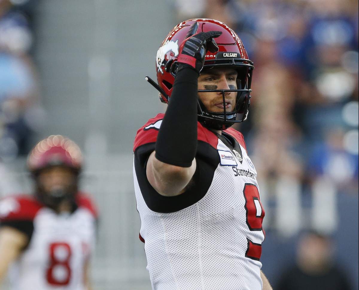 Then-Calgary Stampeders quarterback Nick Arbuckle (9) gets set to throw against the Winnipeg Blue Bombers during the first half of CFL action in Winnipeg on Thursday, Aug. 8, 2019.
