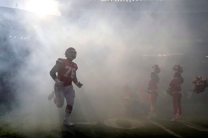 Kansas City Chiefs' Laurent Duvernay-Tardif (76) is introduced before the NFL AFC Championship football game against the Kansas City Chiefs Sunday, Jan. 19, 2020, in Kansas City, MO. 