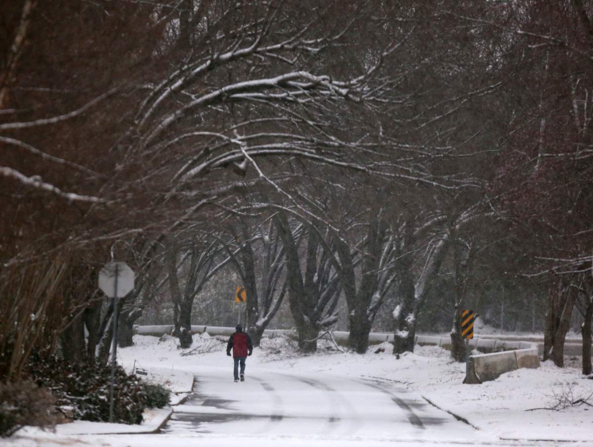A winter storm brings snow to the Tulsa, Okla. area on Wednesday.