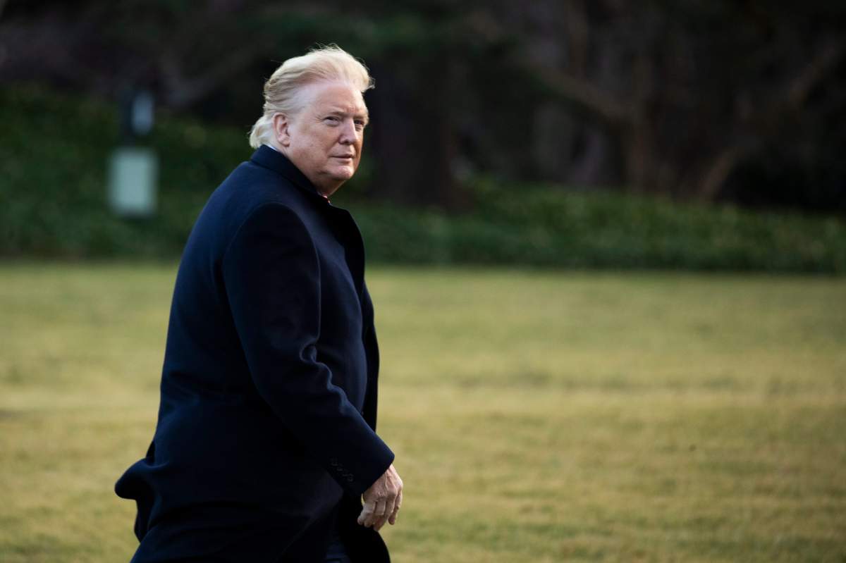 President Donald Trump arrives at the White House, Feb. 7, 2020, in Washington, as he returns from a trip to Charlotte, N.C.
