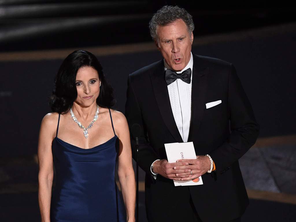 Julia Louis-Dreyfus, left, and Will Ferrell present the award for Best Cinematography at the Oscars on Sunday, Feb. 9, 2020, at the Dolby Theatre in Los Angeles, Calif.