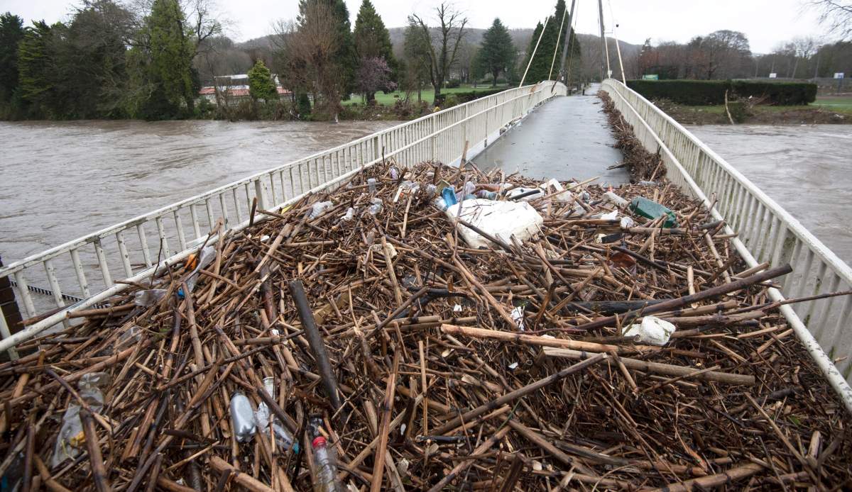 Some of the debris left behind from the river Taff as it overflowed in Pontypridd, South Wales, Britain, Feb. 16, 2020, after Storm Dennis hit the area last night bringing torrential rains, floods and landslides.