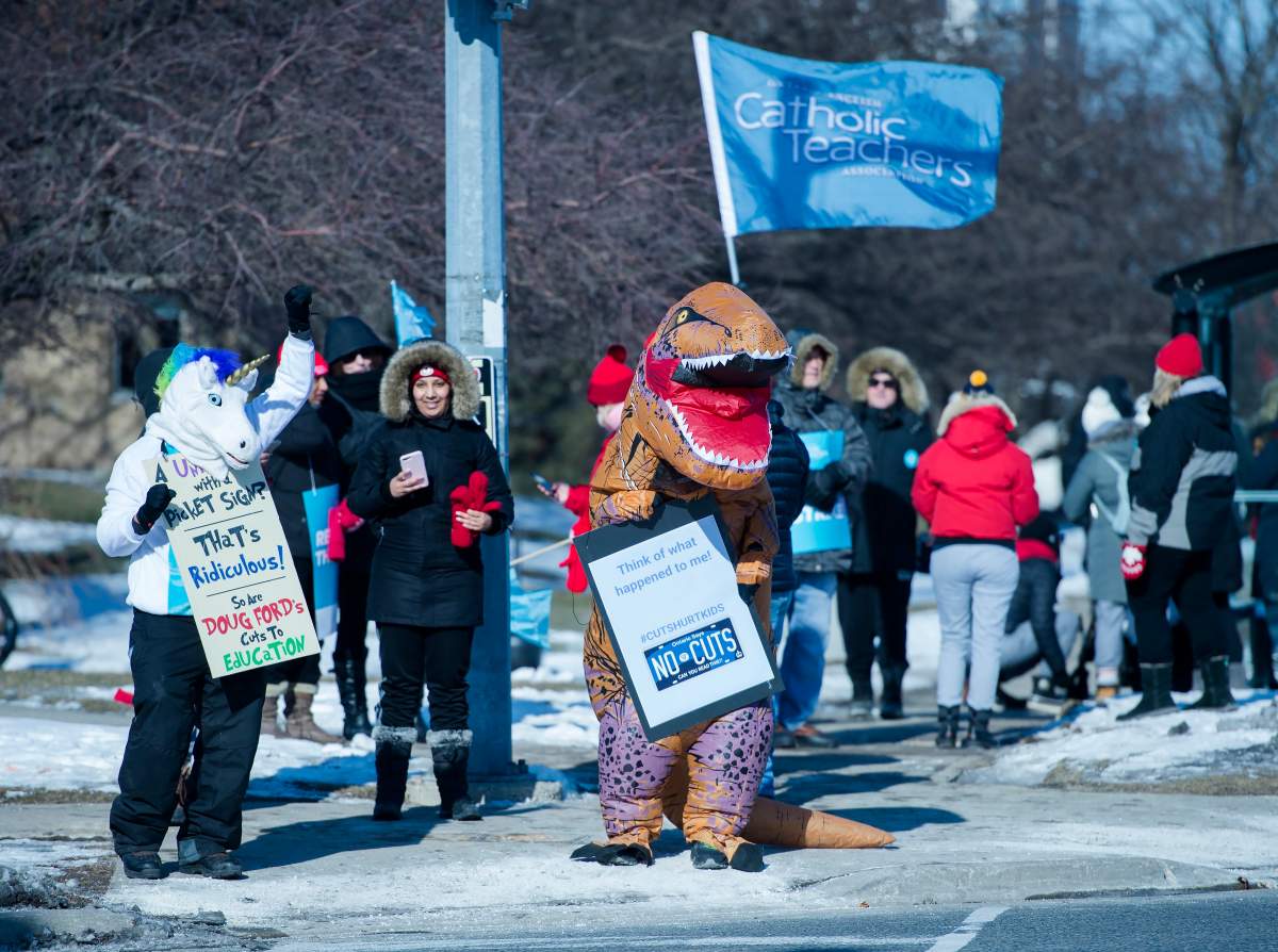 Approximately 20,000 teachers from the Peel District School Board hold a one day strike in Mississauga, Ont., on Friday, Feb. 21, 2020. The Guinness Book of World Records has been notified as some believe it could be the longest picket line of all time.