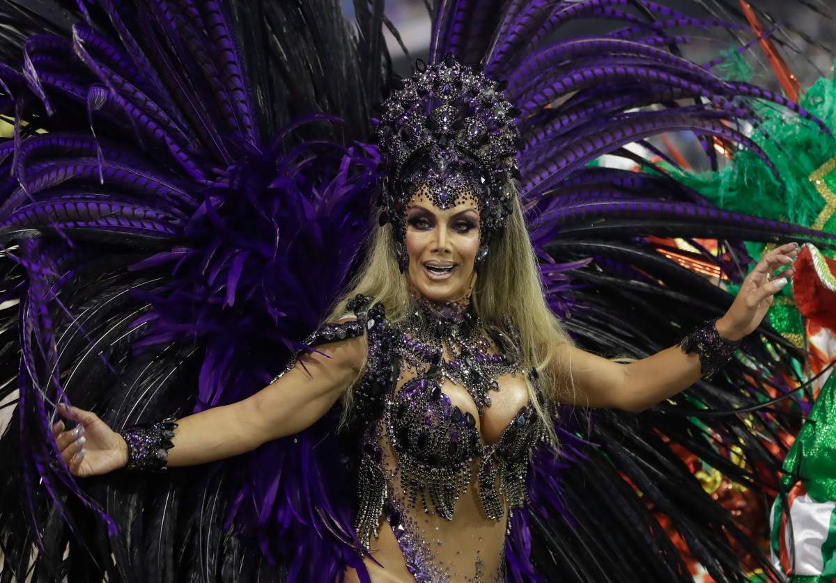 Transgender godmother Camila Prins, representing the Colorado do Bras samba school, performs at Carnival in the Sambadrome in Sao Paulo, Brazil, Feb. 22, 2020.