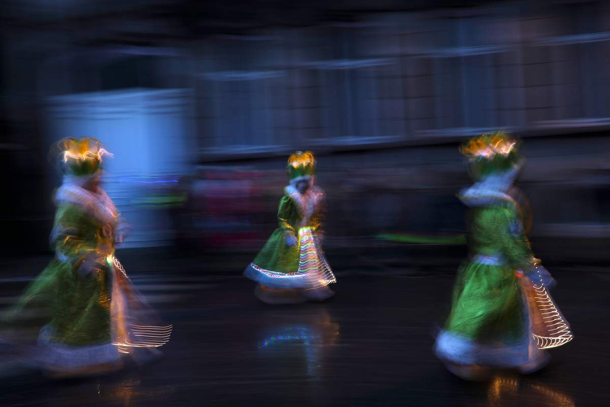 Revelers dressed in carnival costumes take part in the annual carnival parade in Aalst, Belgium, Sunday, Feb. 23, 2020. The Aalst Carnival parade included stereotypical depictions of Jews for the second year in a row and the Belgian government said that the anti-Semitism in the three-day festival embarrassed the nation and endangers society. (AP Photo/Francisco Seco).