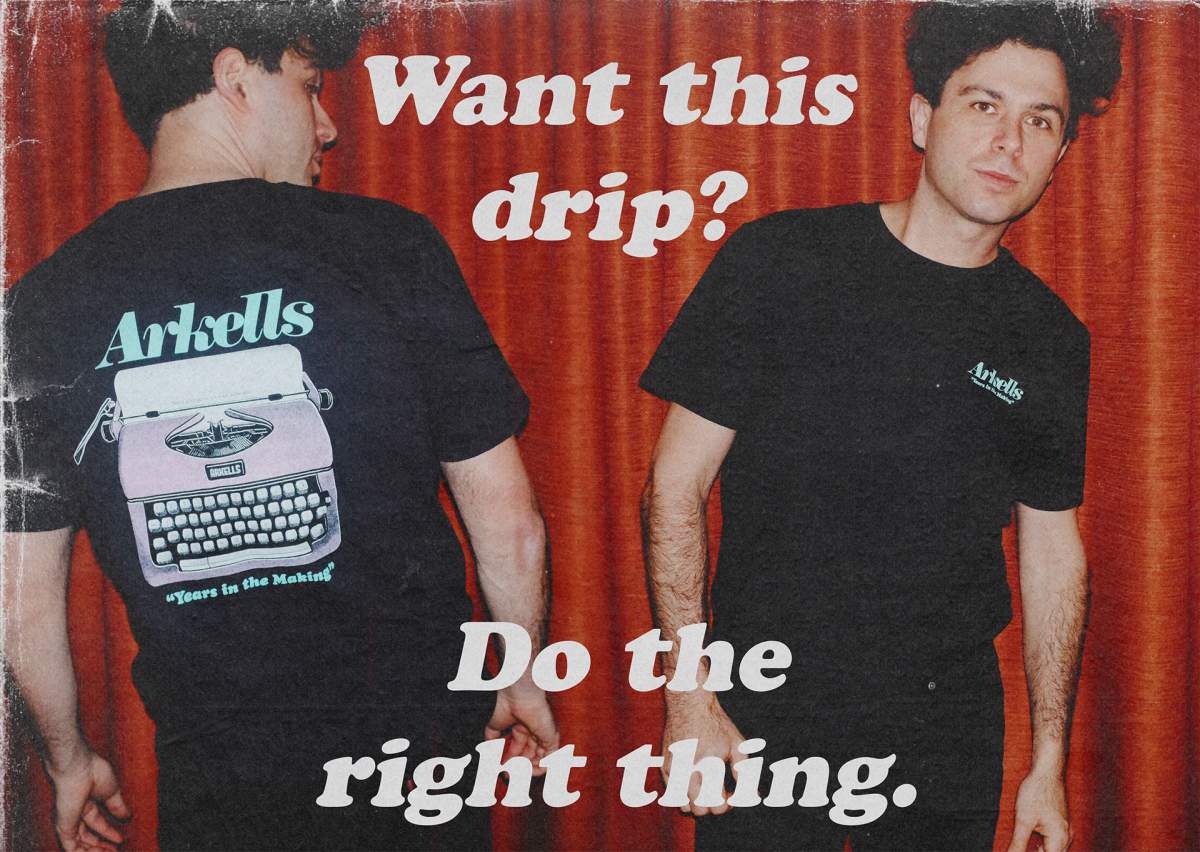 Arkells frontman Max Kerman fashions a free T-shirt being offered to those who buy subscriptions to local online news.