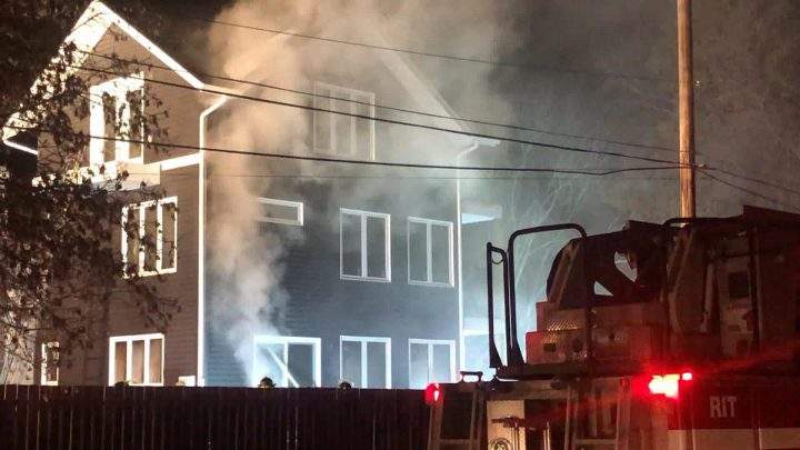 The Saskatoon Fire Department said flames were coming from the exterior of the two-storey home under construction when they arrived.