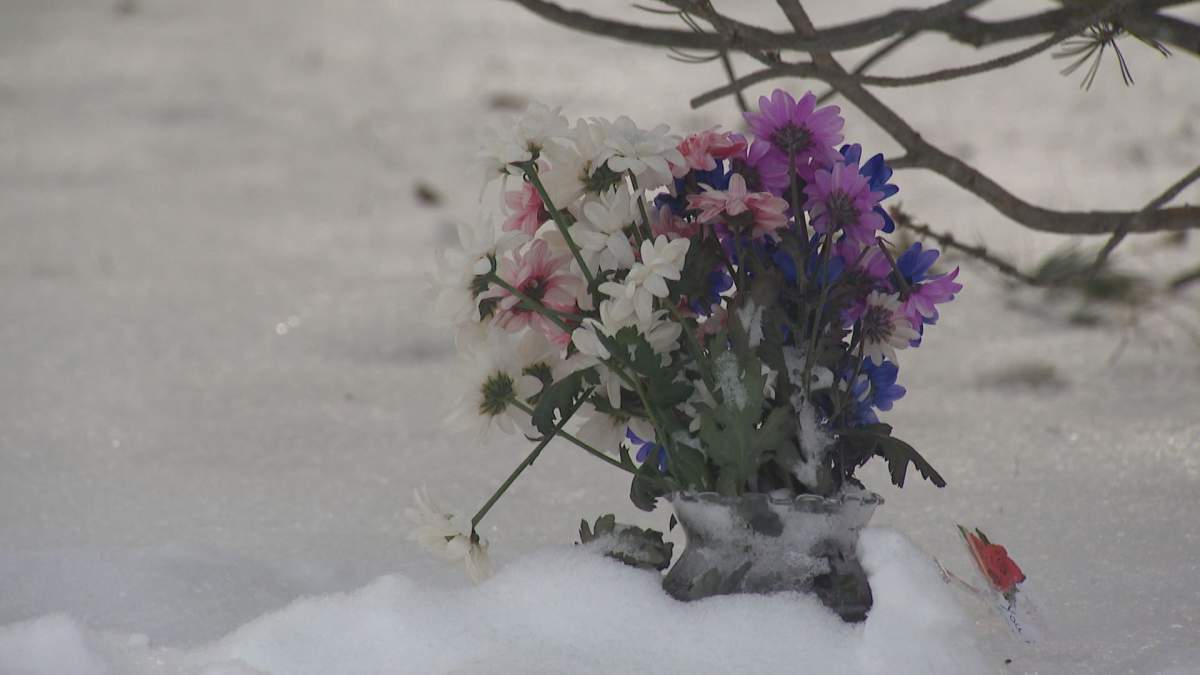 Flowers paying tribute to Blommaert near the scene where she was found.