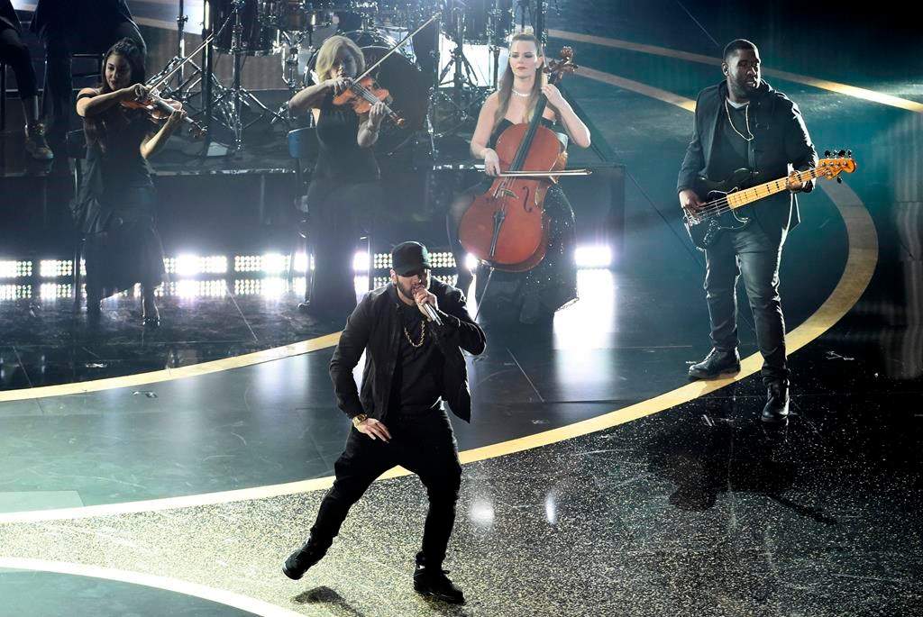 Eminem performs “Lose Yourself” at the Oscars on Sunday, Feb. 9, 2020, at the Dolby Theatre in Los Angeles. (AP Photo/Chris Pizzello)