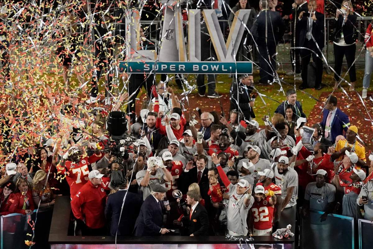 NFL Hall of Fame player Terry Bradshaw congratulates Kansas City Chiefs owner Clark Hunt and Norma Hunt after the team won Super Bowl 54 on Sunday, Feb. 2, 2020, in Miami Gardens, Fla.
