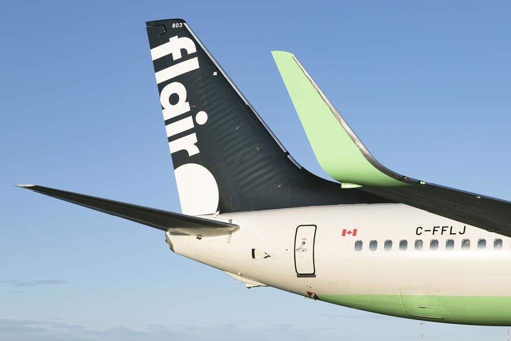 The tail section of a Flair Airlines plane is seen in this undated handout photo. THE CANADIAN PRESS/HO, Flair Airlines *MANDATORY CREDIT*.