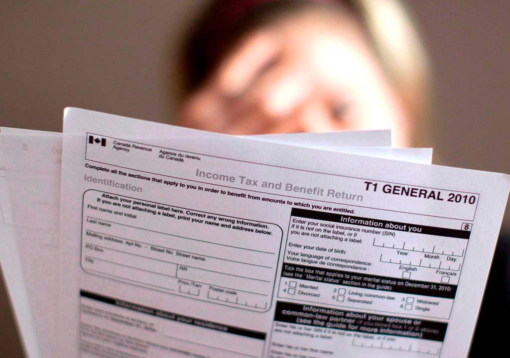 A tax return form is pictured in Toronto on Wednesday April 13, 2011.