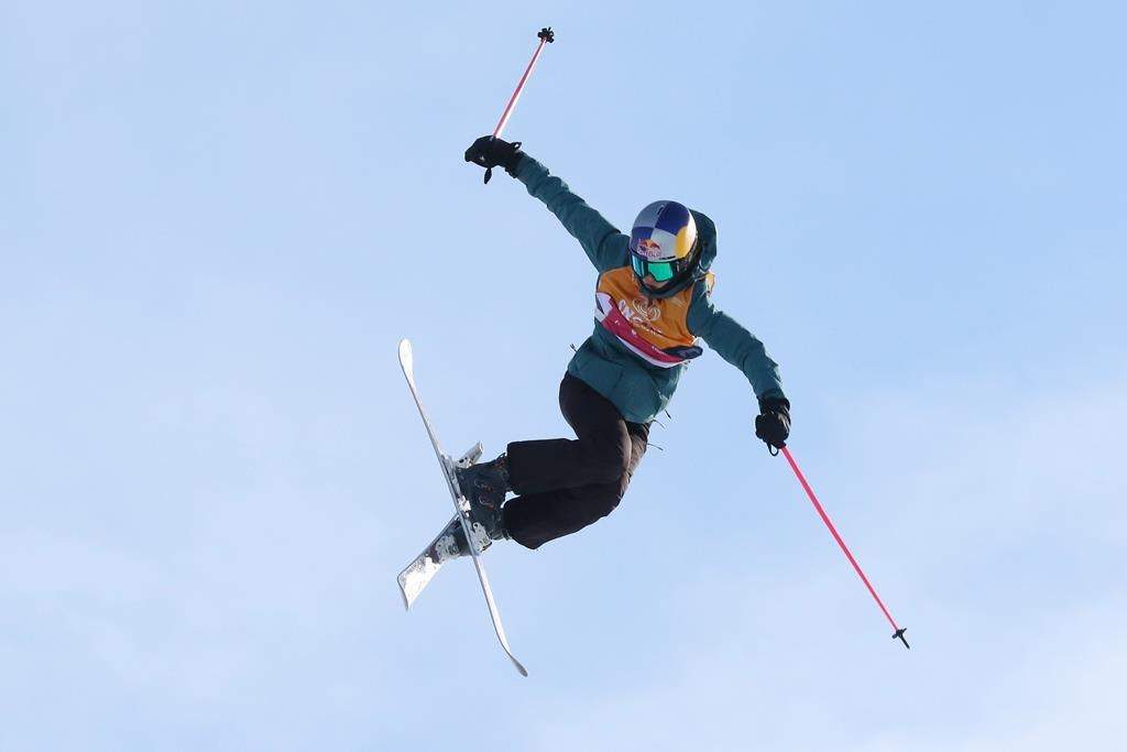 Eileen Gu, of China, competes during a run in the finals of the women's slopestyle at a World Cup freestyle skiing event in Calgary, Alberta on Saturday, Feb. 15, 2020.