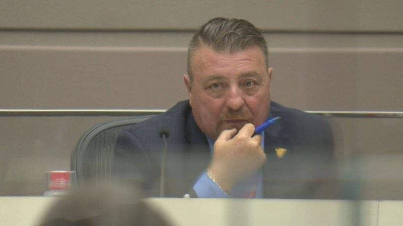 Former Calgary Coun. Joe Magliocca sits in a committee meeting.