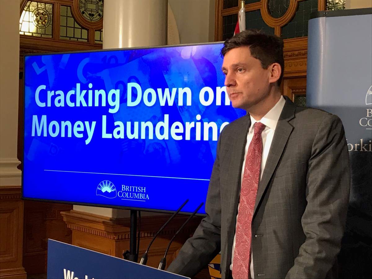 Attorney General David Eby speaks to reporters before the province's money laundering inquiry begins. 