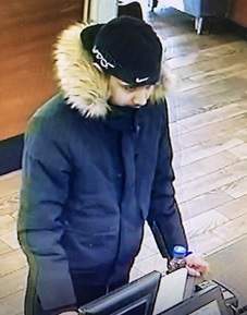 Cobourg police say this man allegedly used fake U.S. currency to purchase items in Cobourg.