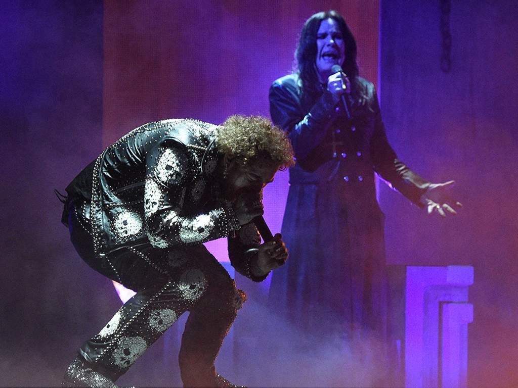(L-R) Post Malone and Ozzy Osbourne perform onstage during the 2019 American Music Awards at Microsoft Theater on Nov. 24, 2019 in Los Angeles, Calif.