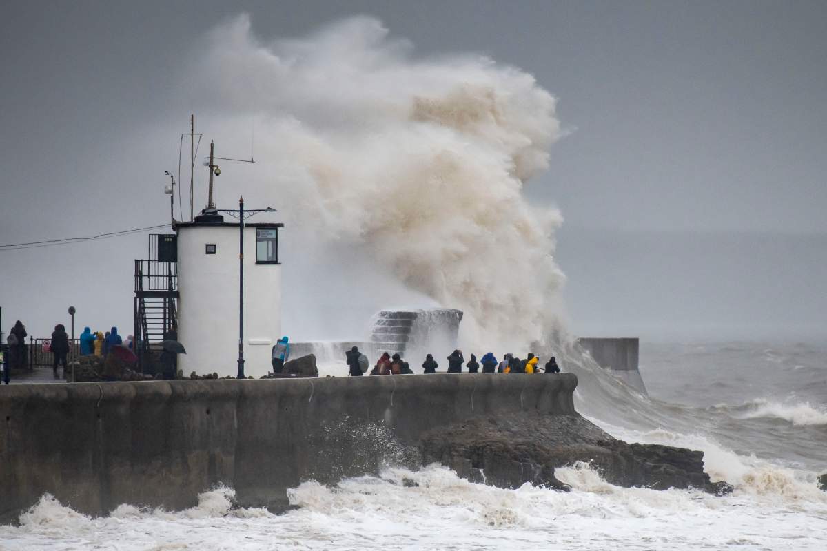 Waves crash against the harbour wall on Feb. 15, 2020 in Porthcawl, United Kingdom.