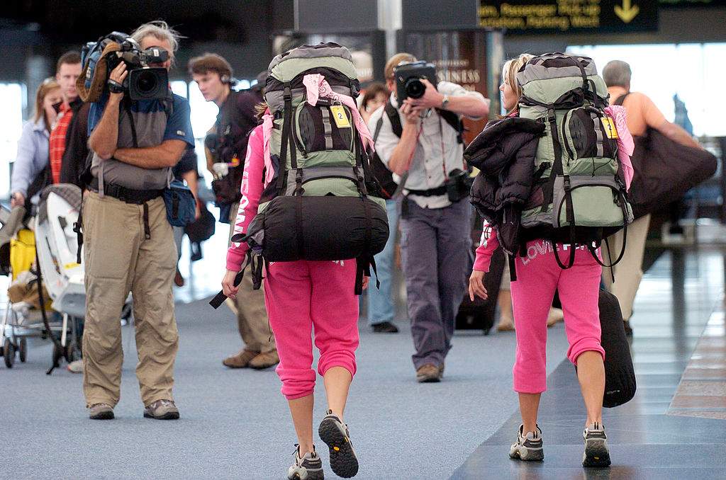 A couple participating in 'The Amazing Race' is caught on camera in the Denver airport.