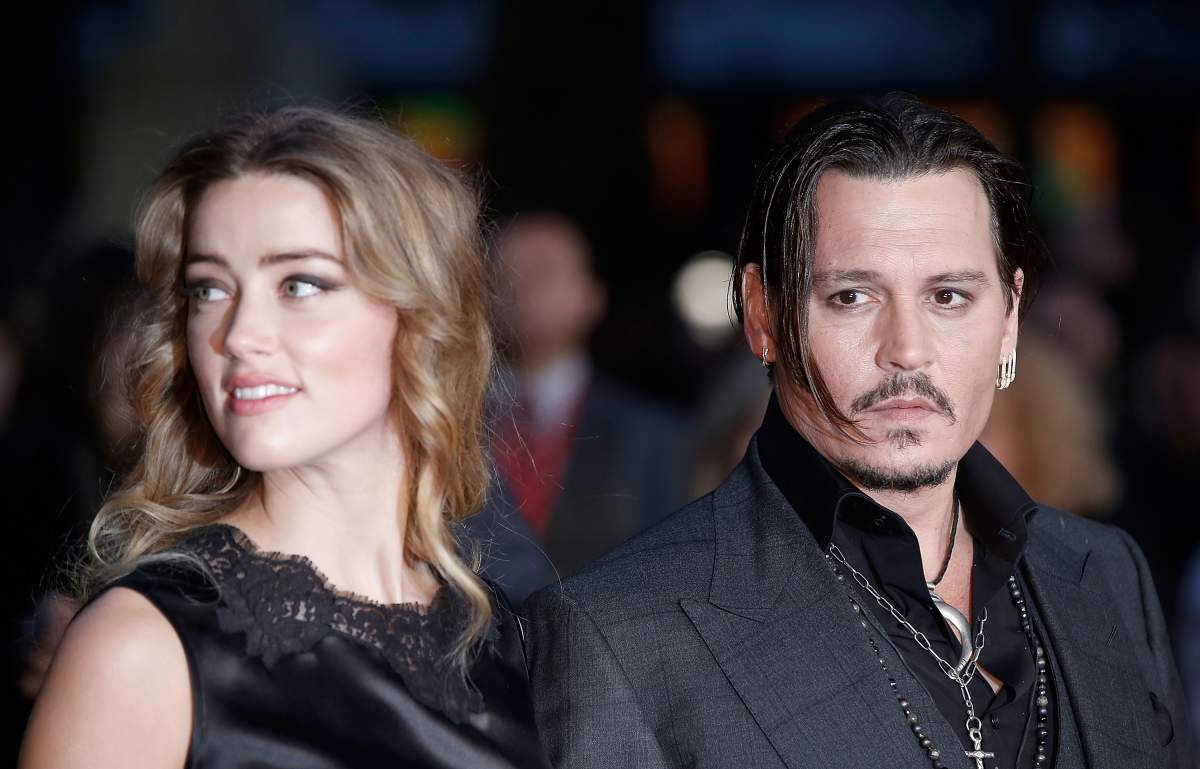 Amber Heard and Johnny Depp attend the 'Black Mass' Virgin Atlantic Gala screening during the BFI London Film Festival, at Odeon Leicester Square on Oct. 11, 2015 in London, England.
