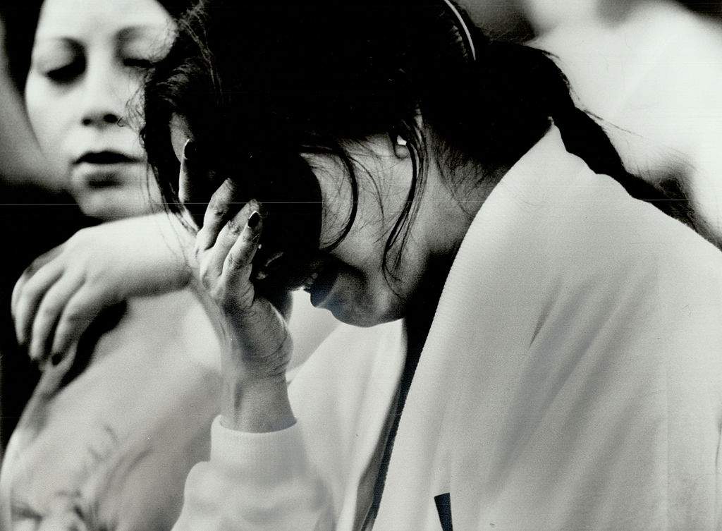 Mina Sarangi, the mother of Air India plane crash victim 14-year-old Rajashree Sarangi, cries during a memorial service in Nathan Phillips Square. (Photo by Jeff Goode/Toronto Star via Getty Images)