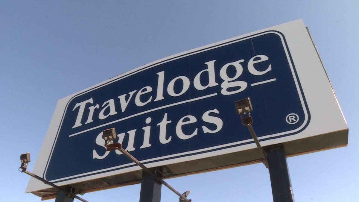 A Travelodge Suites sign