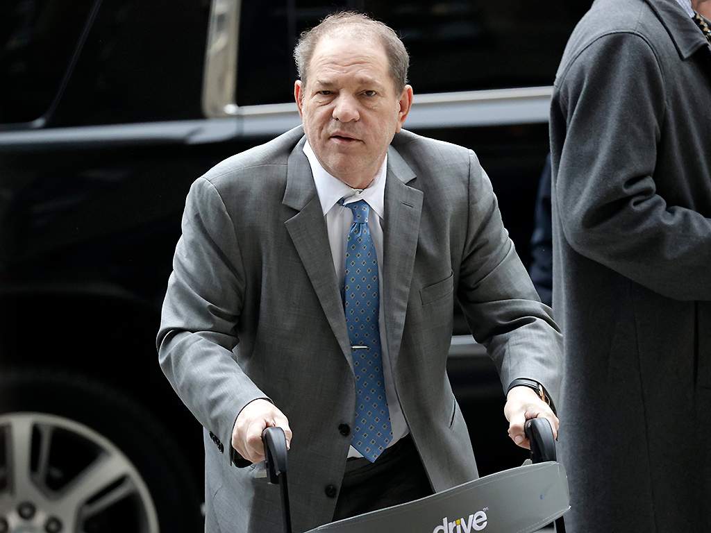 Harvey Weinstein arrives with his lawyers for his sexual assault trial at New York State Supreme Court in New York City on Feb. 18, 2020.