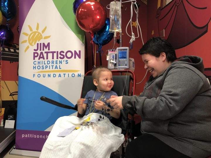 Weston Delorme, 3, and his mom Shelby at the announcement that CIBC was donating $250,000 to create a family comfort fund to help young cancer patients.