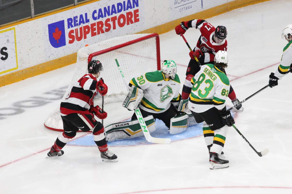 London Knights goaltender Brett Brochu lunges a leg across the crease to make a save against the Ottawa 67’s.