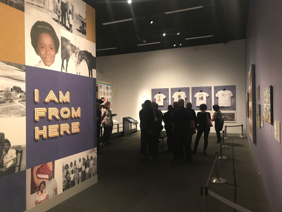 Deborah Dobbins gives a tour of the “I Am From Here” exhibit at the Royal Alberta Museum. The exhibit highlights the ways African American pioneers helped build Alberta.