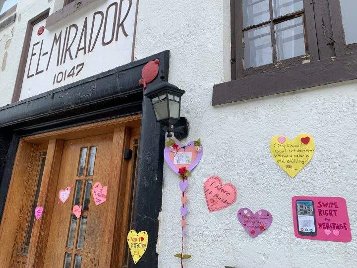 Love notes posted on the El Mirador apartment building.