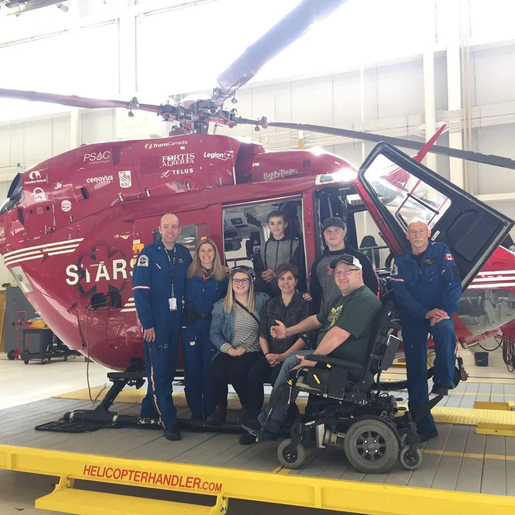 Jason Lunn poses with the STARS crew