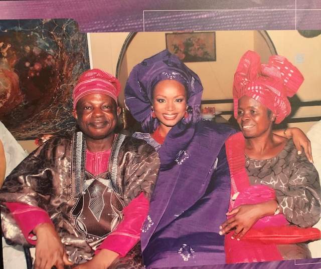 Jibs Abitoye and her parents while on a trip to Nigeria