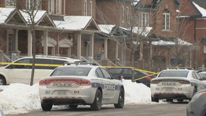 Police at the scene of the stabbing on Sunday.