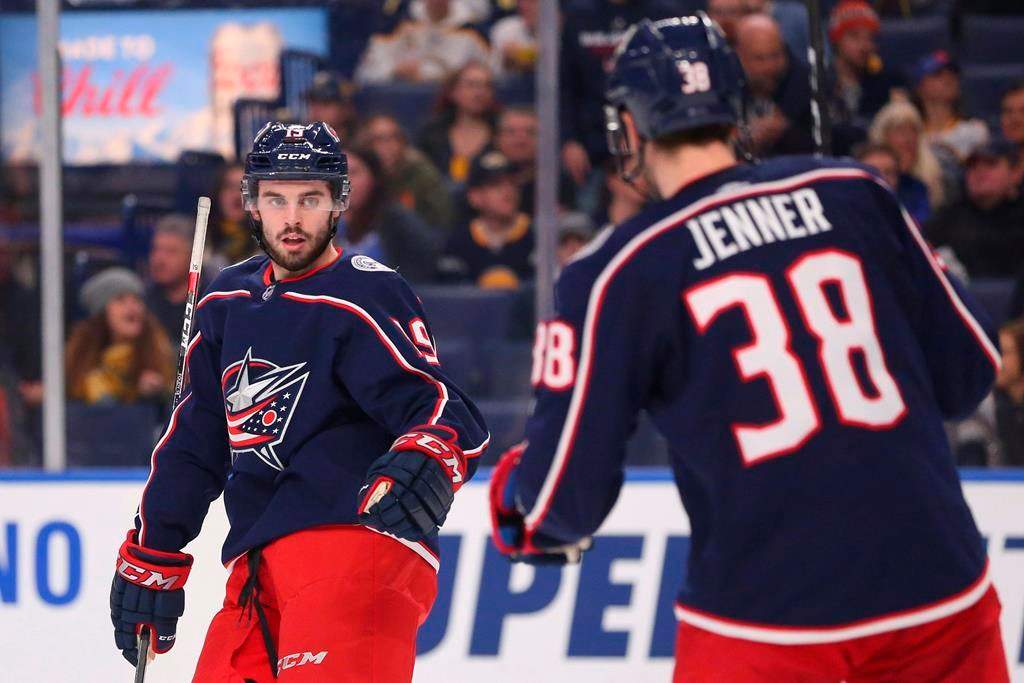 Columbus Blue Jackets forward Boone Jenner celebrates his goal with forward Liam Foudy against the Buffalo Sabres, Feb. 13, 2020, in Buffalo, N.Y.
