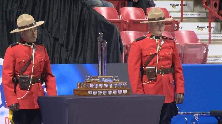 Members of the Saskatchewan RCMP carried in the Sandra Schmirler Most Valuable Player Award at the Scotties Tournament of Hearts at Mosaic Place.