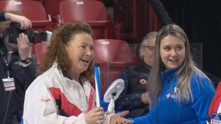 Sandra Schmirler’s daughter Sara England (right) helped kick-off the opening ceremony with Schmirler’s former teammate Joan McCusker.