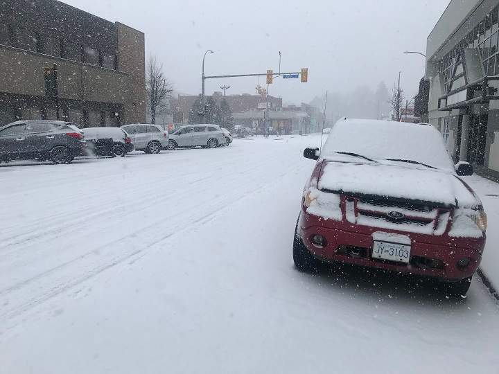 Downtown Kelowna on Tuesday morning. Environment Canada was calling for 2 to 4 cm starting at noon, but snowfall began shortly after 9:30 a.m.