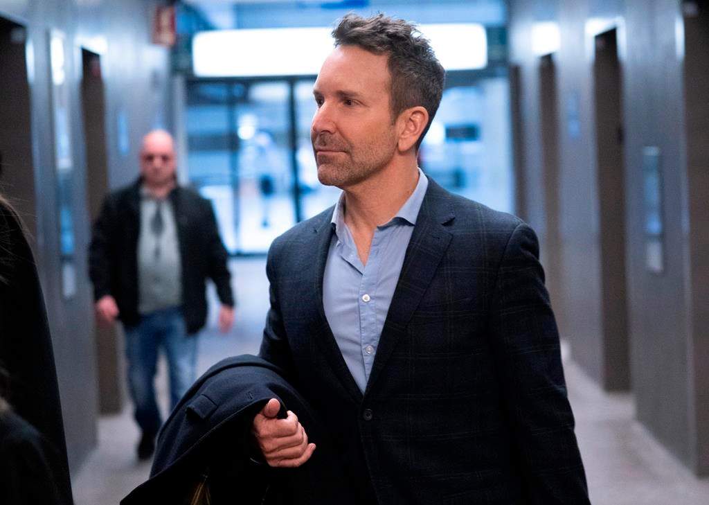 Former radio and television personality Eric Salvail arrives at the courthouse in Montreal on Wednesday.
