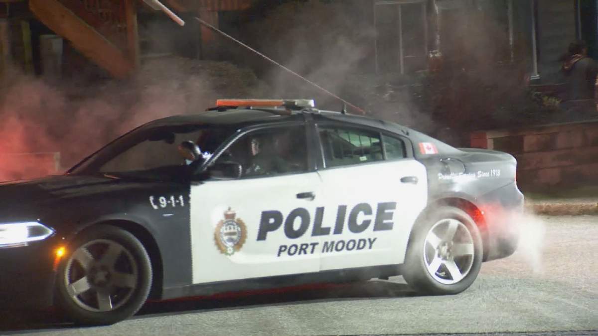 Port Moody police outside a home where an 18-year-old barricaded himself inside on Feb. 8, 2020.