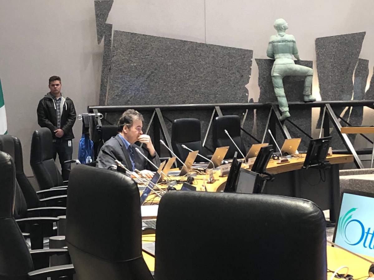 College Ward Coun. Rick Chiarelli pictured a Ottawa city council in Feb. 2020. Two reports from the city's integrity commissioner found sexual misconduct complaints against the councillor were founded. One of those complainants is now suing the city.