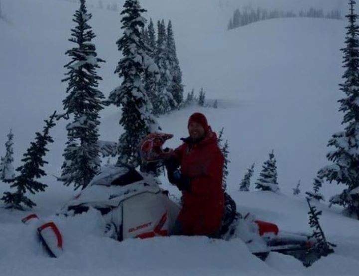 Sledder Sam Johnson pictured on a less eventful ride. Johnson  was partially buried by an avalanche on Saturday. 
