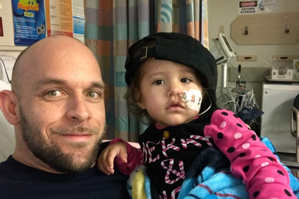Lawrence Hill and his daughter Savannah at LHSC’s Children’s Hospital.