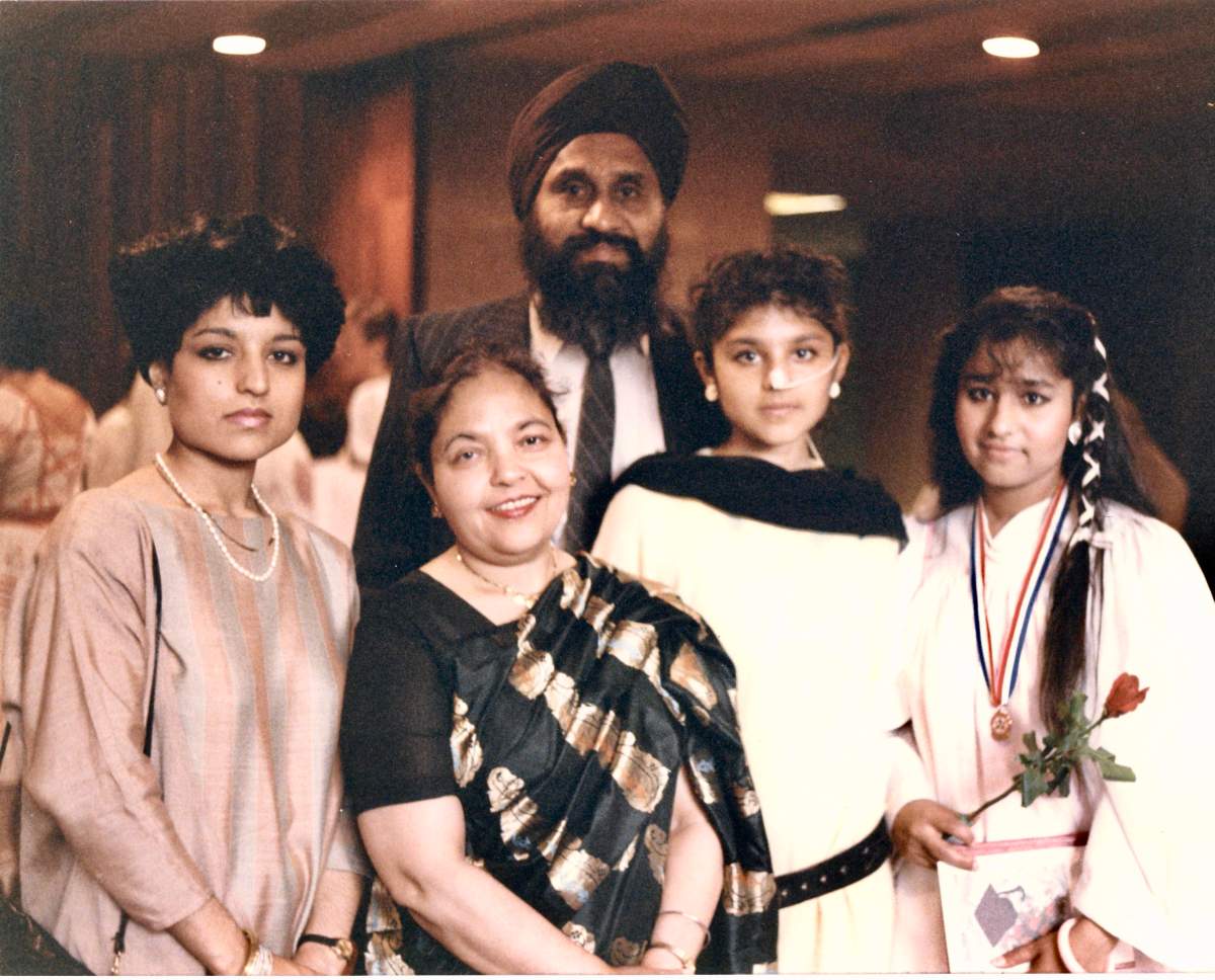 Eisha Marjara’s family pictured at her sister Seema’s high school graduation. Seema and her mother Devinder died the day after the photo was taken in the Air India bombing. From left to right: Amita Marjara, Devinder Marjara, Harinder Marjara, Eisha Marjara and Seema Marjara. Photo provided by Eisha Marjara.