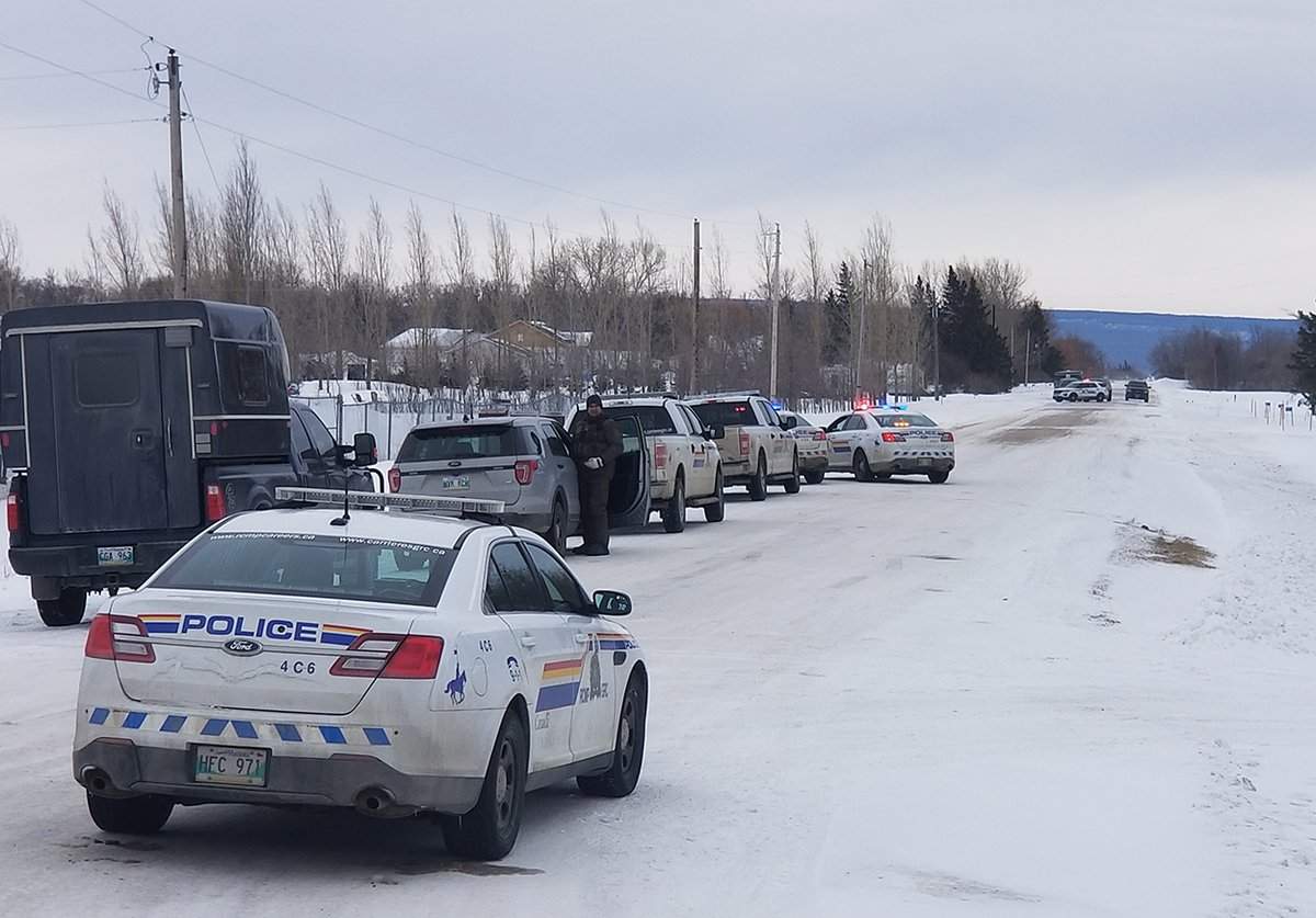 Manitoba RCMP at a home in Eclipse, Man.